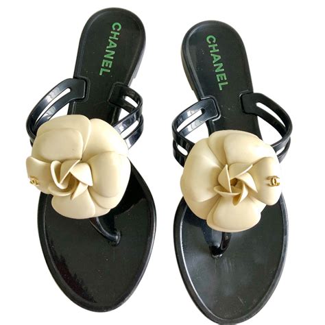 chanel jelly sandals with flower.